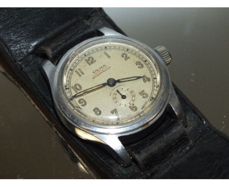 A VINTAGE GENTS OLMA AUTOMATIC MILITARY STYLE WRISTWATCH 