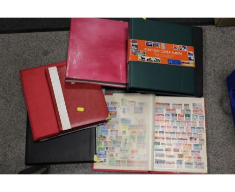 SEVEN ALBUMS OF WORLD STAMPS AND FIRST DAY COVERS