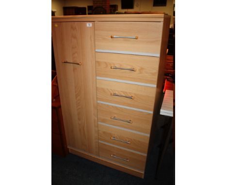 A MODERN LIGHT OAK STORAGE CABINET WITH CUPBOARD AND 6 DRAWERS W-84 CM X D-52 CM X H- 140 CM