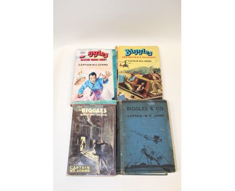 FOUR CAPTAIN W.E. JOHNS BIGGLES BOOKS COMPRISING OF A FIRST EDITION 'BIGGLES &amp; CO', A FRENCH 'BIGGLES ENTRE EN SCENE' WIT