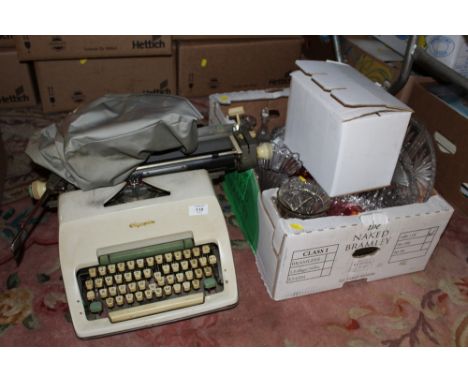 A TRAY OF GLASSWARE TOGETHER WITH SEVEN PIECES OF CRANBERRY STYLE GLASS TOGETHER WITH A VINTAGE OLYMPIA TYPEWRITER