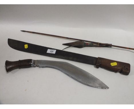 A VINTAGE TAYLOR MACHETE STAMPED WITH A CROWS FOOT AND DATED 1944, TOGETHER WITH THREE SPEAR HEADS AND A KNIFE (5)