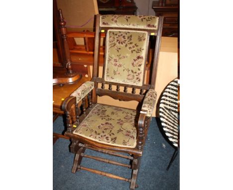 A VINTAGE MAHOGANY ROCKER WITH SPINDLED BACK