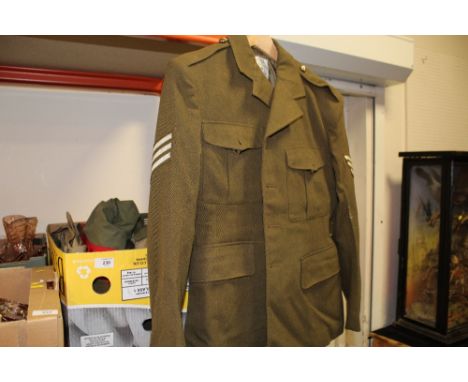 A VINTAGE MILITARY JACKET TOGETHER WITH A BOX OF MILITARIA ETC