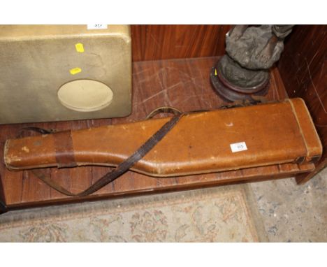 A VINTAGE LEATHER GUN CASE