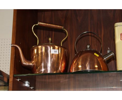 A VINTAGE COPPER KETTLE TOGETHER WITH ANOTHER