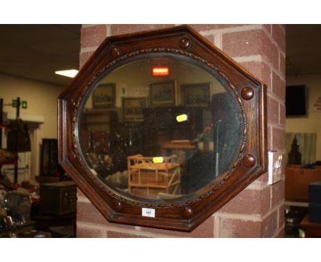 A VINTAGE OAK OCTAGONAL BEVELLED MIRROR W-60  CM