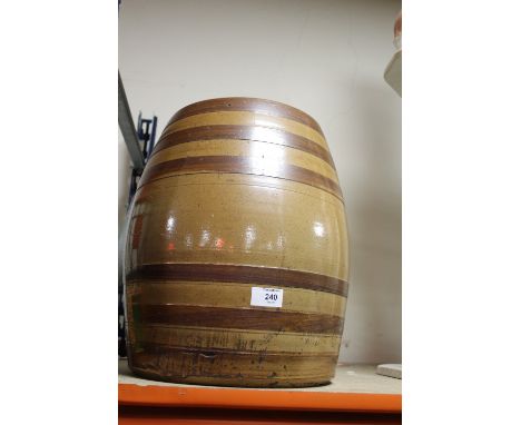 A LARGE CERAMIC BARREL