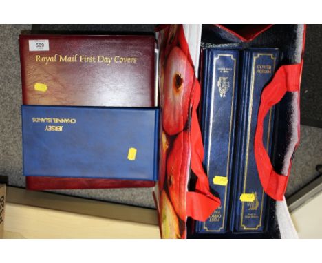A COLLECTION OF FIRST DAY COVERS IN ALBUMS 