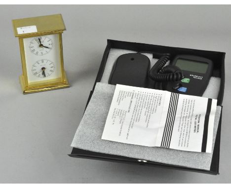 A Sewills dual time quartz carriage clock, 11cm high, together with a sinometer LX1010B digital lux meter