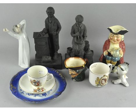 A Doulton character jug, Dick Turpin, Nao figure - Yawning Boy, Sylvac character jug, two further figures, a bird figure and 
