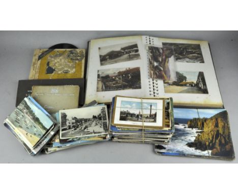 A quantity of postcards, including album and Private Eye Annuals, Oil lamp collector's pamphlets and children's records