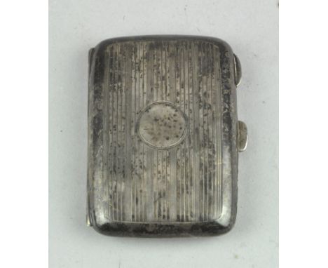 A George V silver cigarette case of rounded rectangular form, opening to reveal a gilt interior, hallmarked Birmingham 1920 b