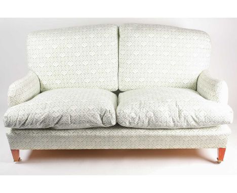 Howard & Sons "Bridgwater" two-seater sofa. With factory logo cotton ticking and manufacturers label on the underside. The re
