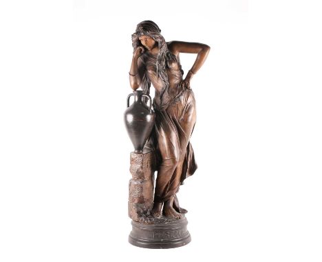 Frederick Goldscheider Vienna. "Rebecca" is a painted terracotta figure bearing factory mark to the rockwork and entitled at 