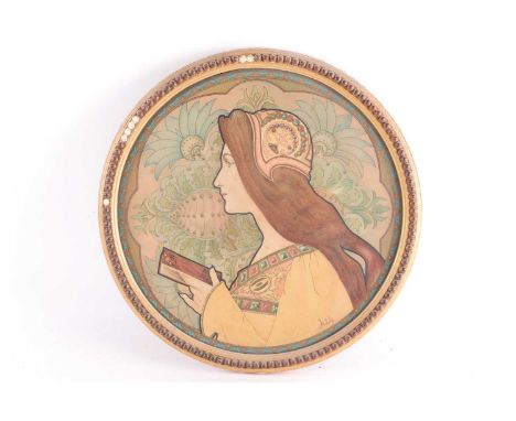 Jane Atché (1872-1937) French, 'Femme au Livre', a circular art nouveau portrait of a woman, facing left and holding a book, 
