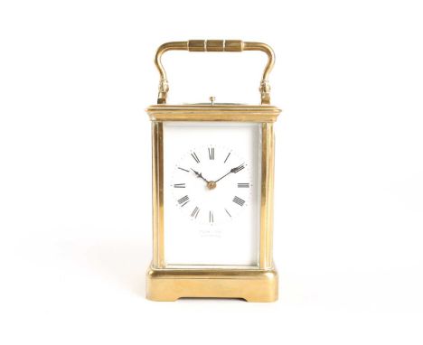 An early 20th century 8-day corniche cased repeat carriage clock. Retailed by Elkington of Liverpool. With a white enamel dia