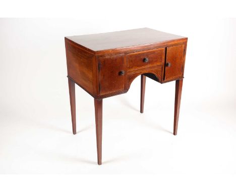 An Edwardian satinwood and tulipwood banded mahogany caddy topped kneehole dressing table with one frieze and two flanking dr