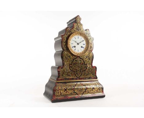 Breguet A Paris. A19th century red Boule 8-day mantle clock. The silk suspension movement chiming the half hours Marked Bregu