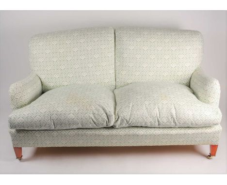 Howard &amp; Sons "Bridgwater" two-seater sofa. With factory logo cotton ticking and manufacturers label on the underside. Th