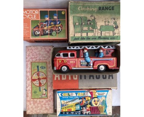 Tinplate: A collection of assorted vintage tinplate toys to include Betal Cooking Range, TT (Japan) Child Train, friction mot