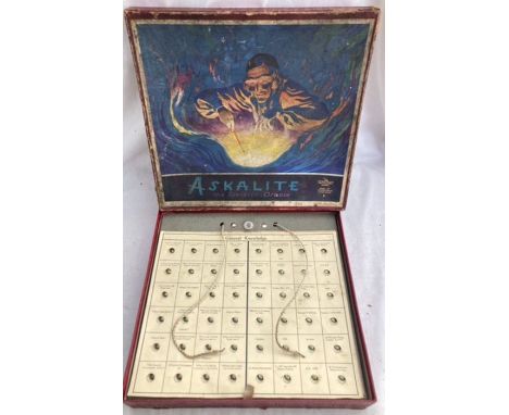 Chad Valley: A boxed Chad Valley Askalite, the electric oracle. Battery operated game with lightbulb indicating correct answe