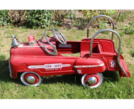 Tinplate: A tinplate child's pedal car, in the form of a Fire Engine, circa mid-20th century, appears to be all original. Len