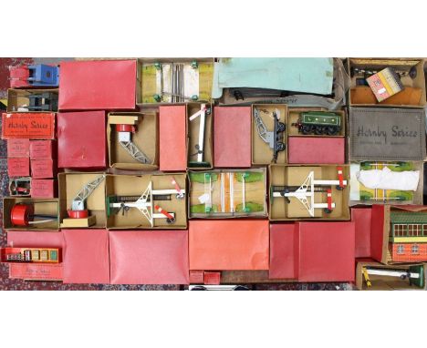 Model Railway: A collection of assorted O Gauge boxed railway trackside accessories and buildings, together with various Buff