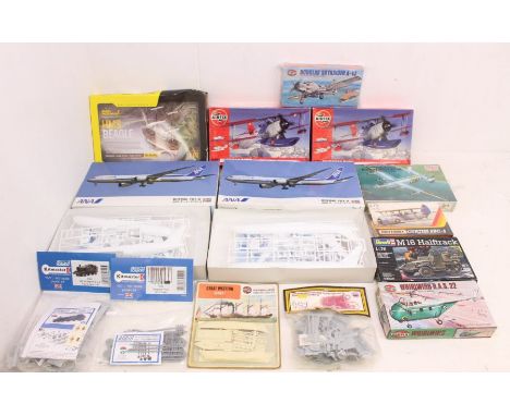 Model Kits: A collection of fourteen assorted model kits to include Airfix, Revell, Kitmaster and others. Appear in complete 