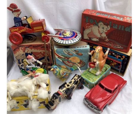 Tinplate: A vintage tinplate collection to include Lawley Crazy Jeep Boxed, (needs attention), Ne Kur Spaceship, boxed, Metto