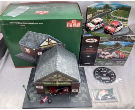 Corgi: A pair of Corgi Diorama sets: Mini Cooper Rib Stacey Restoration Workshop and 1999 Mini Seven and Mini Miglia Champion