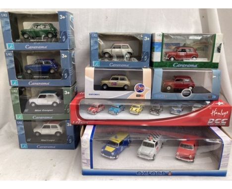 Diecast: A collection of Mini cars and vans by Oxford Die Cast and Cararama. To include 50th anniversary Mini from Oxford Die