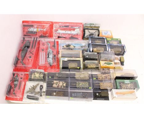 Diecast: A collection of assorted boxed and carded military diecast vehicles including Corgi, Hobbymaster and others. Appear 