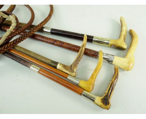FIVE VINTAGE HUNTING CROPS / WHIPS, three with antler handles, one with silver collar, two steel lined (5)