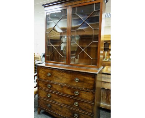 REGENCY MAHOGANY SECRETAIRE BOOKCASE, cavetto cornice above astragal glazed doors enclosing satinwood interior drawers etc, a