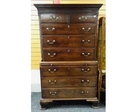 GEORGE III MAHOGANY TALLBOY CHEST, dentil cornice with blind fret frieze and canted corners, fitted arrangement of eight long