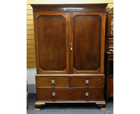 19TH CENTURY MAHOGANY LINEN PRESS, dentil cornice and panelled doors above a base fitted three drawers, ogee bracket feet, 13