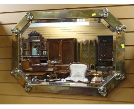 EARLY 20TH CENTURY BRASS FRAMED CANTED RECTANGULAR WALL MIRROR, 88cms wide