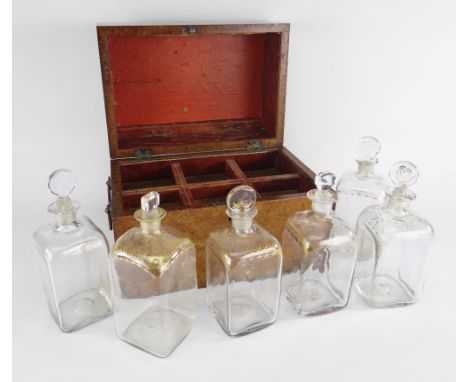 19TH CENTURY BURR WALNUT DECANTER BOX containing six gilt decorated Dutch decanters and stoppers, 30cms wide Condition Report