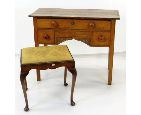 19TH CENTURY OAK LOW BOY AND WALNUT DRESSING STOOL, table with boarded top above arrangement of three drawers fan carved unde