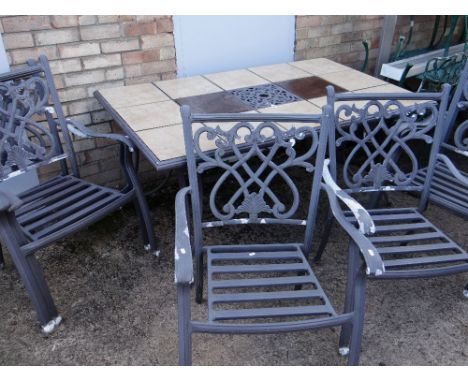 MODERN ALLOY GARDEN TABLE AND SIX CHAIRS, table with inset ceramic tile top, 158cms long Condition Report: armchairs coating 