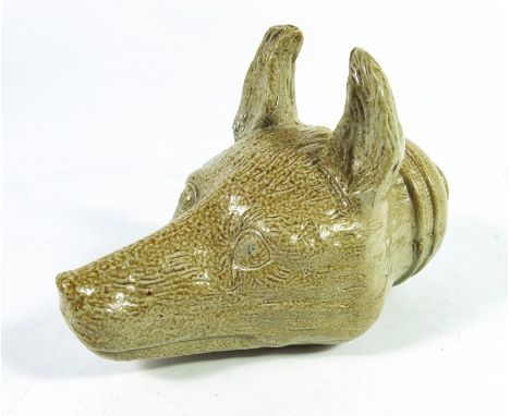 A saltglazed stoneware fox mask flask, probably Stephen Green Imperial Potteries, realistically modelled in relief, 14cm long