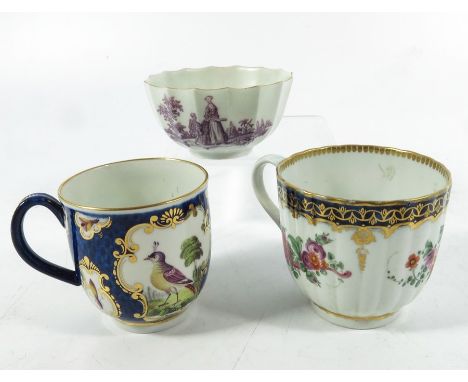 Three Worcester porcelain cups, circa 1760, including a puce transfer printed fluted bowl, a blue fishscale and exotic bird e