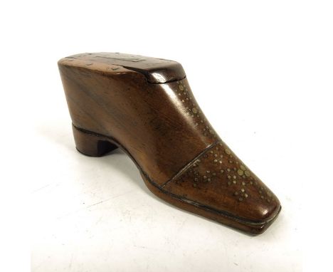 A 19th century carved wood snuff box, in the form of a shoe, rosewood, with brass studding and slide lid, steel heel and toe,