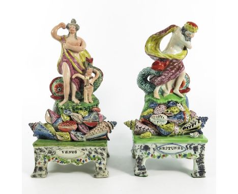 Obadiah Sherratt,  pair of Staffordshire figures of Venus and Neptune, circa 1820, on bracket stands, the figures standing on