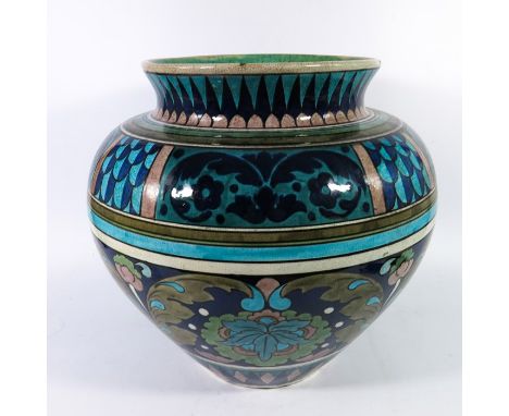 Leonard King for Burmantofts, a large Anglo Persian faience vase, circa 1880, amphora form with flared neck, painted with ban