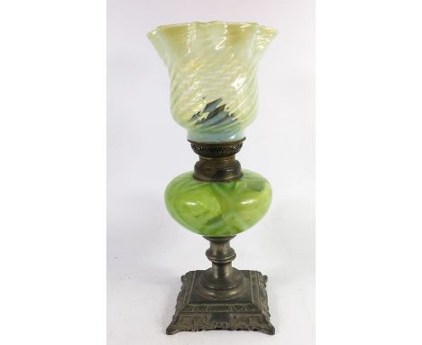 An Arts and Crafts straw opal glass oil lamp, wrythen trailed crimped shade over a diamond moulded reservoir, possibly John W