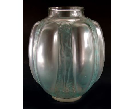 Rene Lalique, a Six Figurines et Masques glass vase, model 886, designed circa 1912, green stained, etched mark to shoulder a