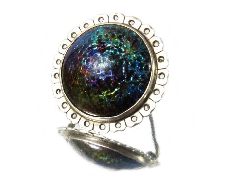 William Mark, an Arts and Crafts silver and enamelled brooch, Chipping Campden, circa 1912, the fire opal enamel cabochon wit