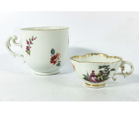 Two Meissen porcelain cups, circa 1740, one of miniature proportions, quatrelobed with scroll handle, the other larger, both 